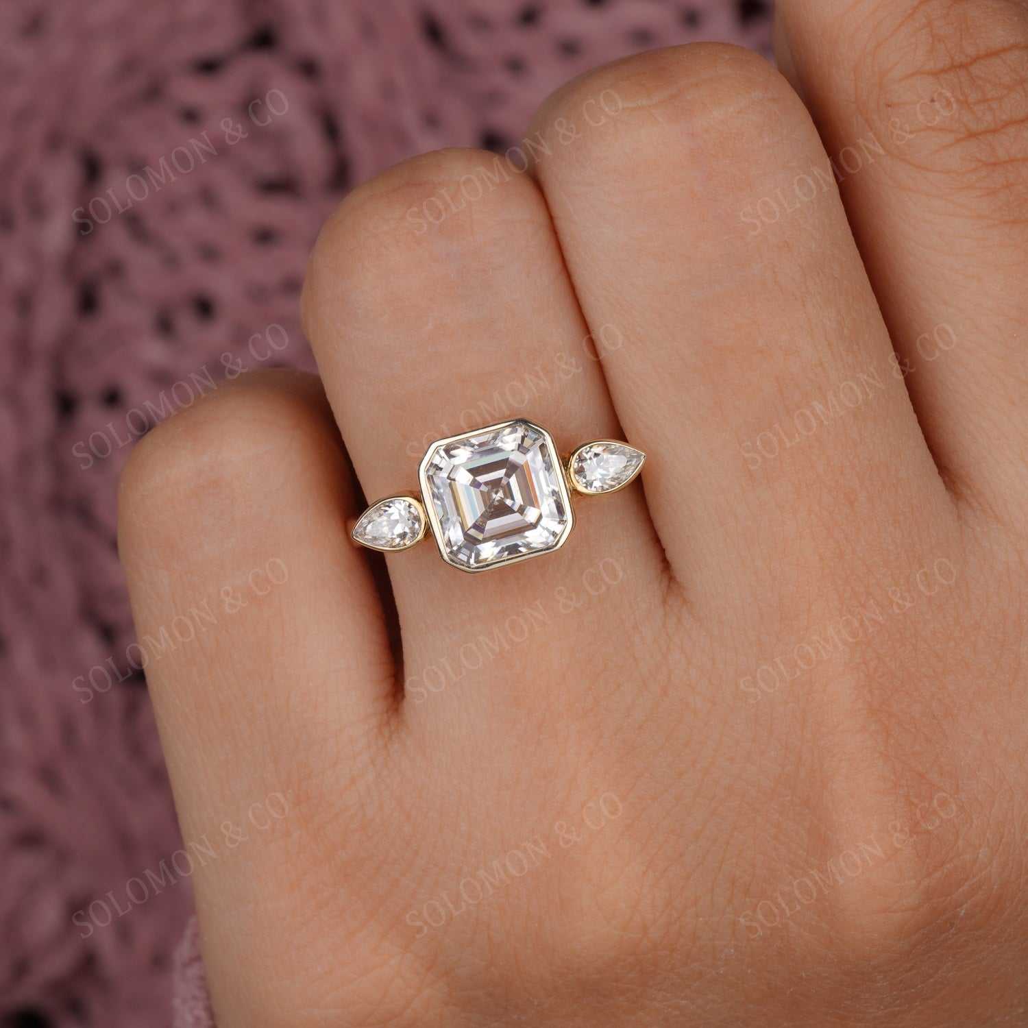 Three Stone Bezel Set Asscher and Pear Shape Moissanite Ring Six