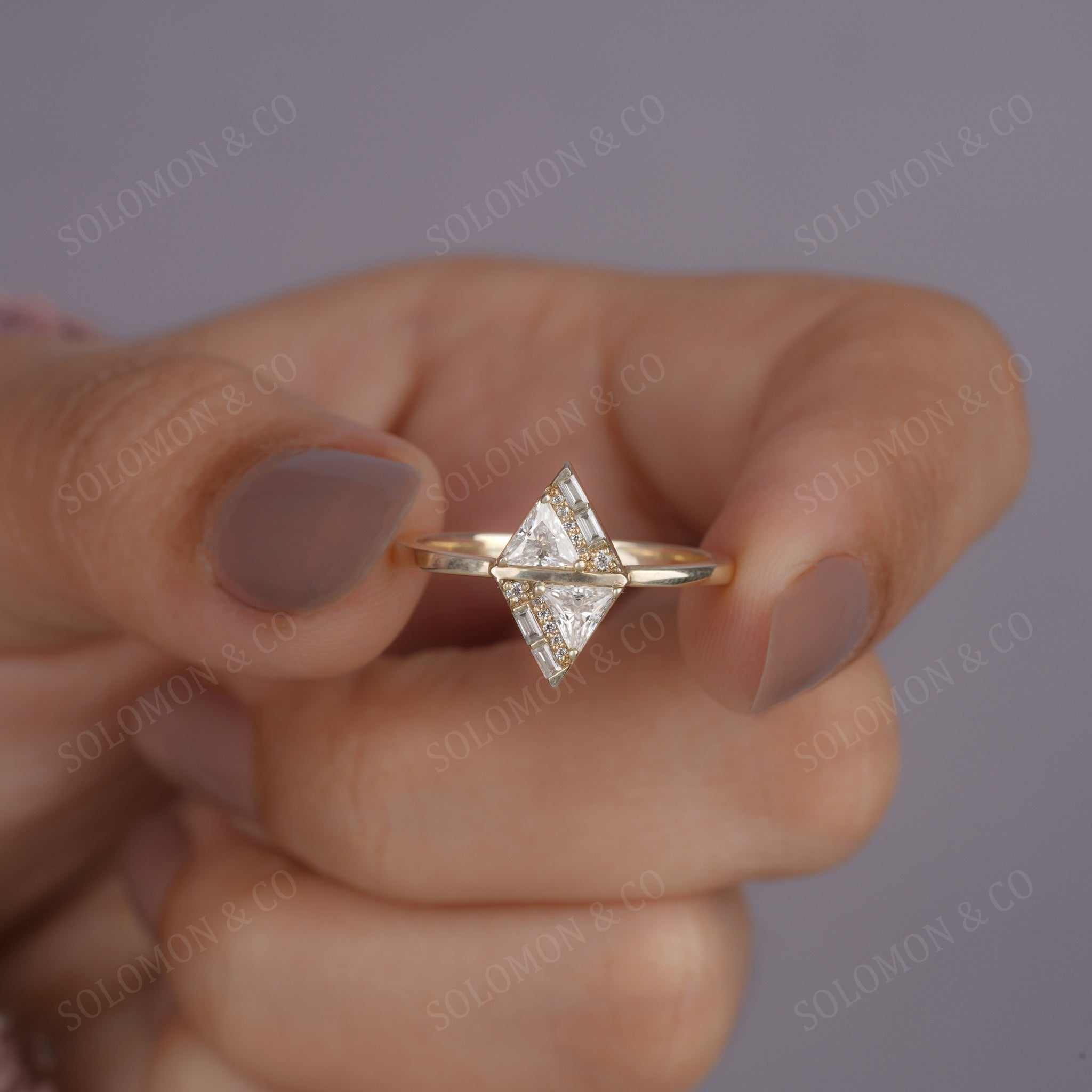 Unique Kite Shaped Solitaire Ring Forth