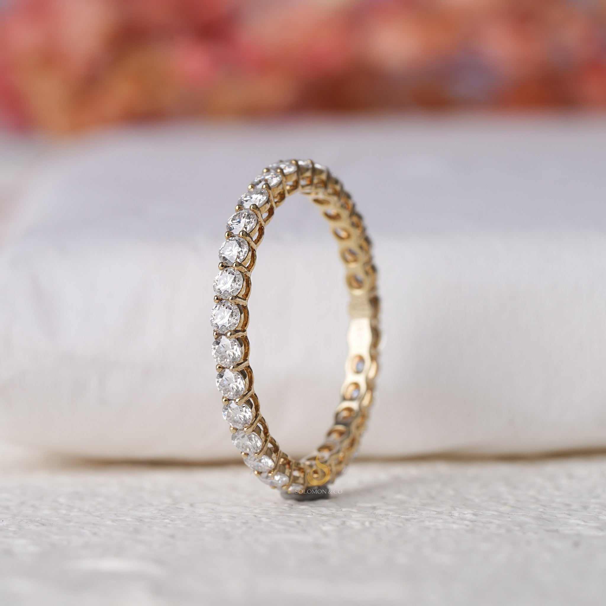 Womens Shared Prong Round Eternity Moissanite Ring