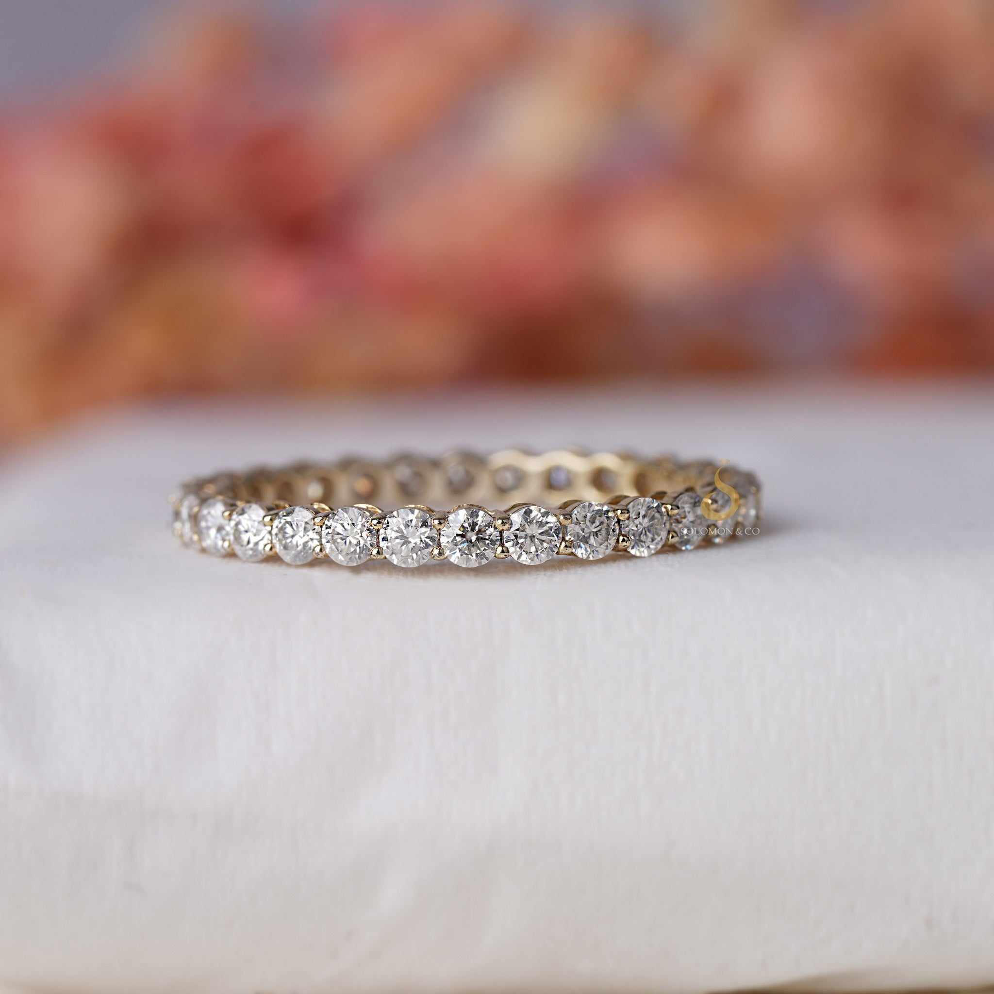 Womens Shared Prong Round Eternity Moissanite Ring
