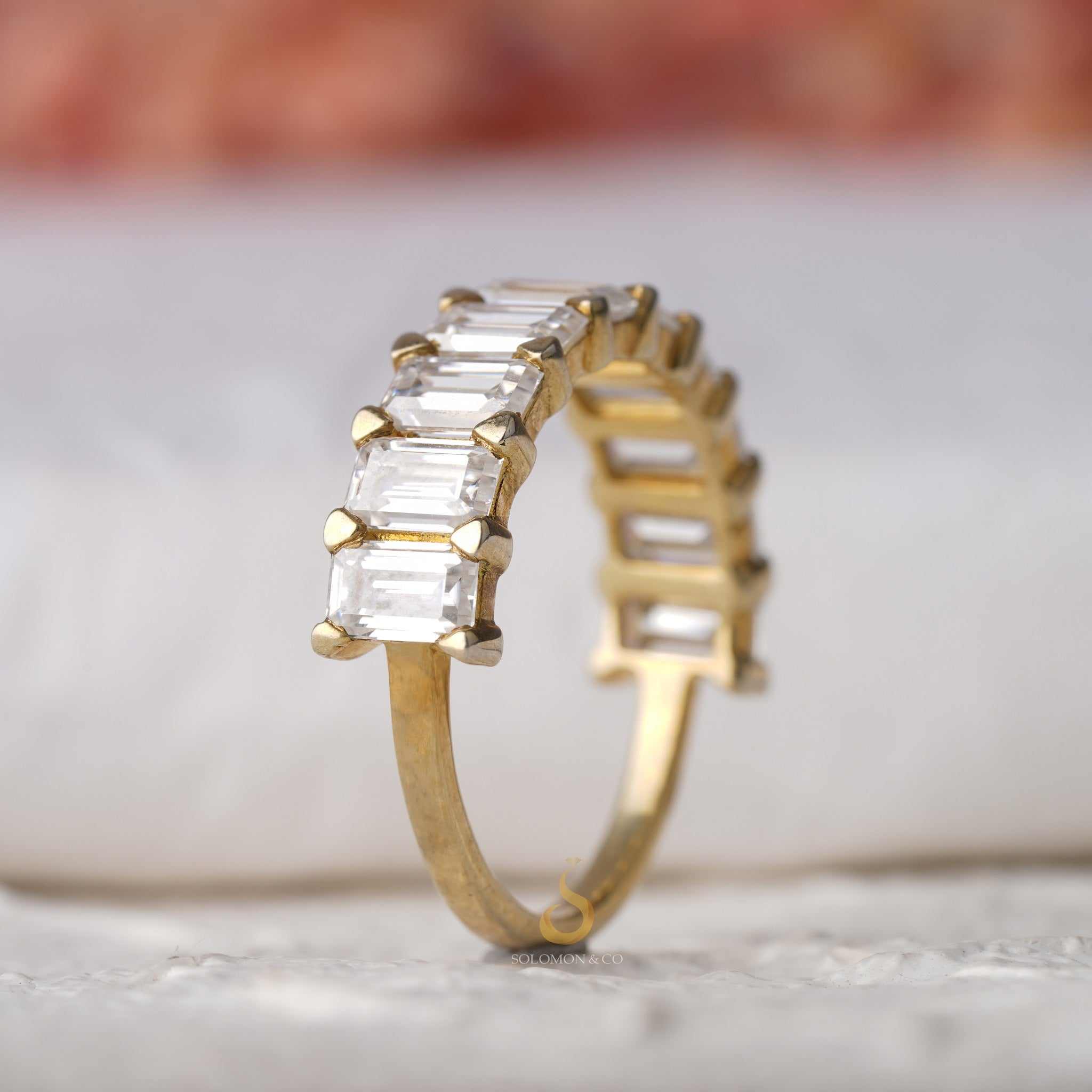 Shared Prong Emerald Cut Half Eternity Band