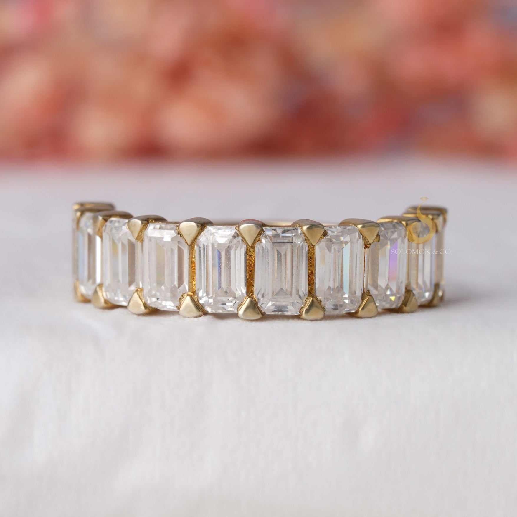 Shared Prong Emerald Cut Half Eternity Band