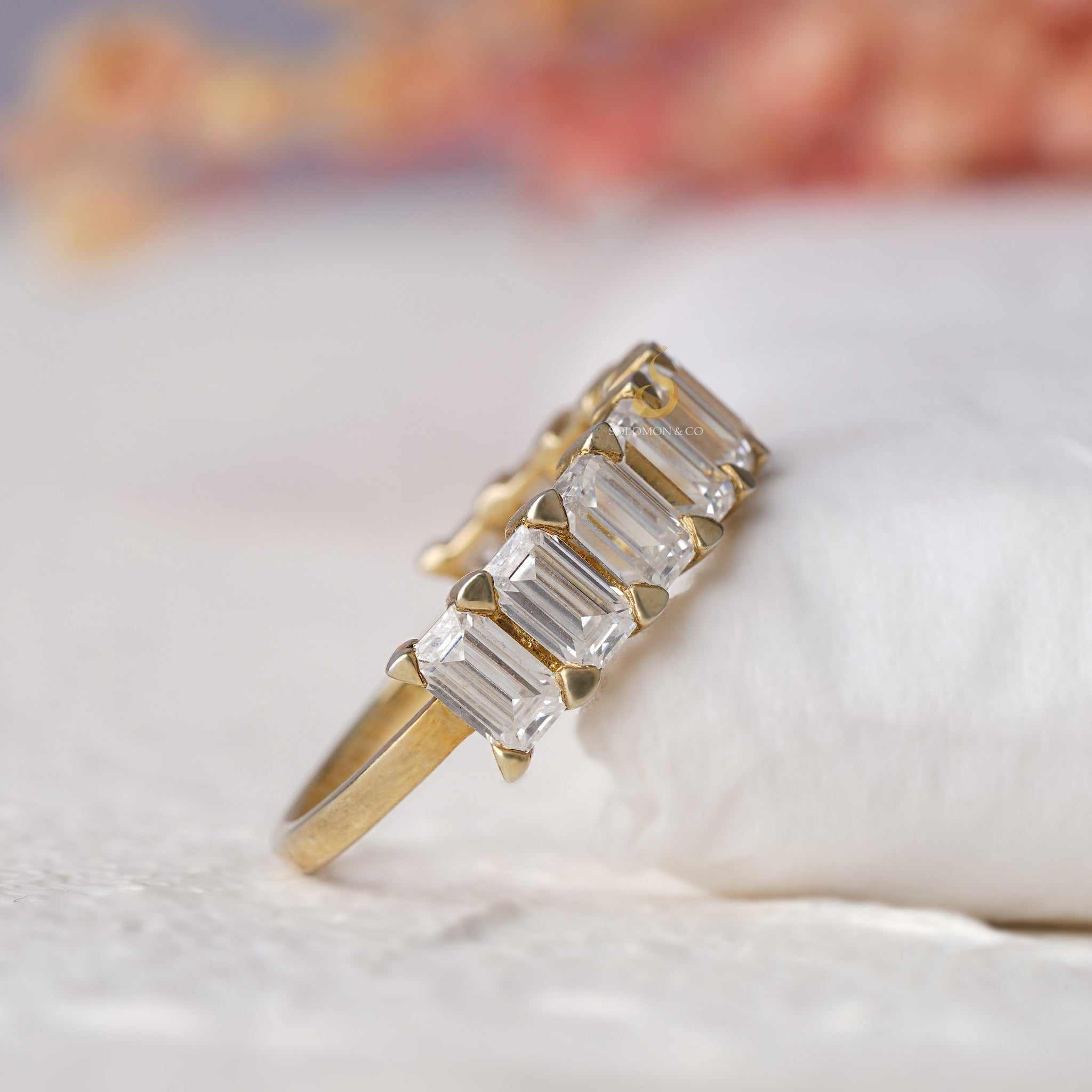 Shared Prong Emerald Cut Half Eternity Band