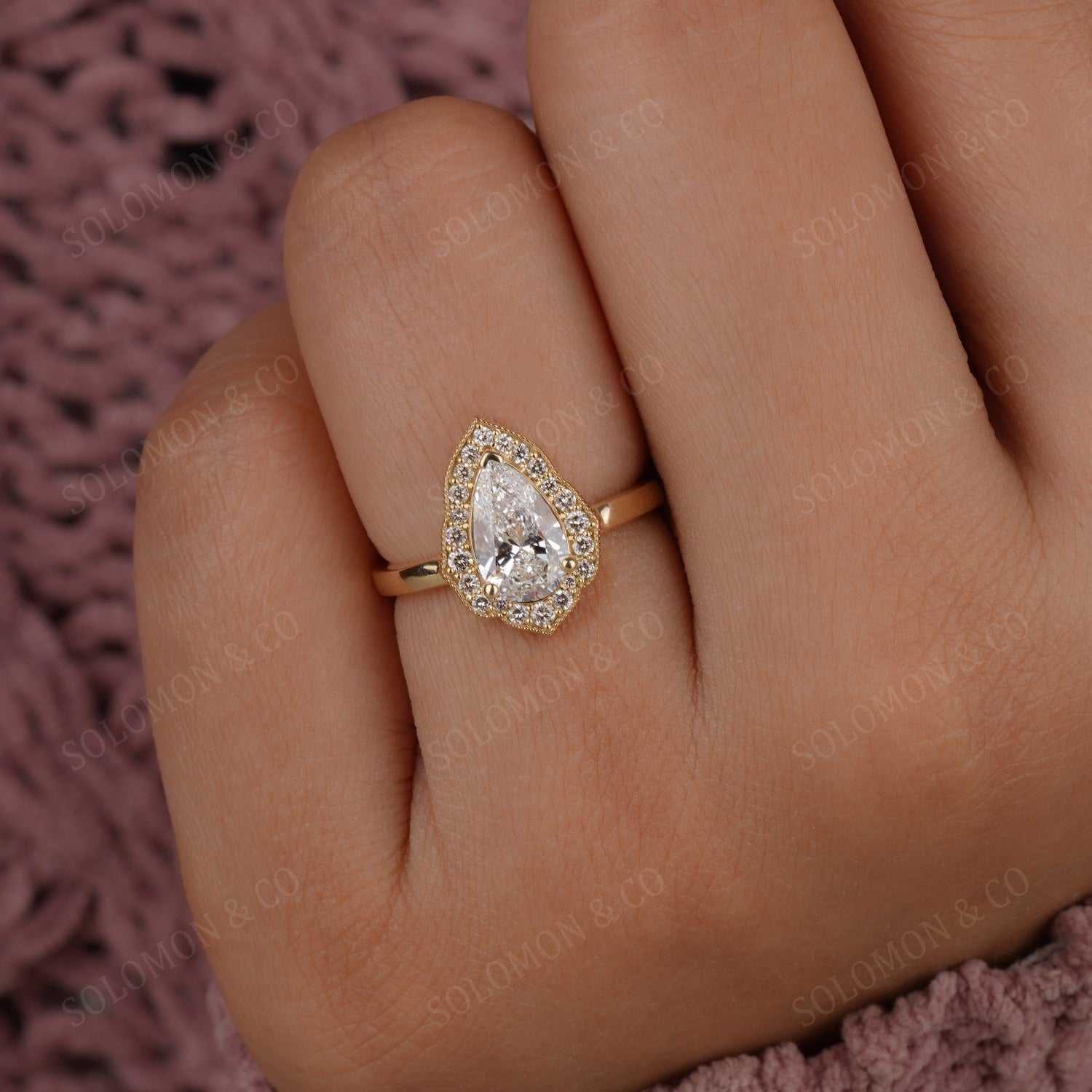 Vintage Style Pear Cut Moissanite Ring Forth