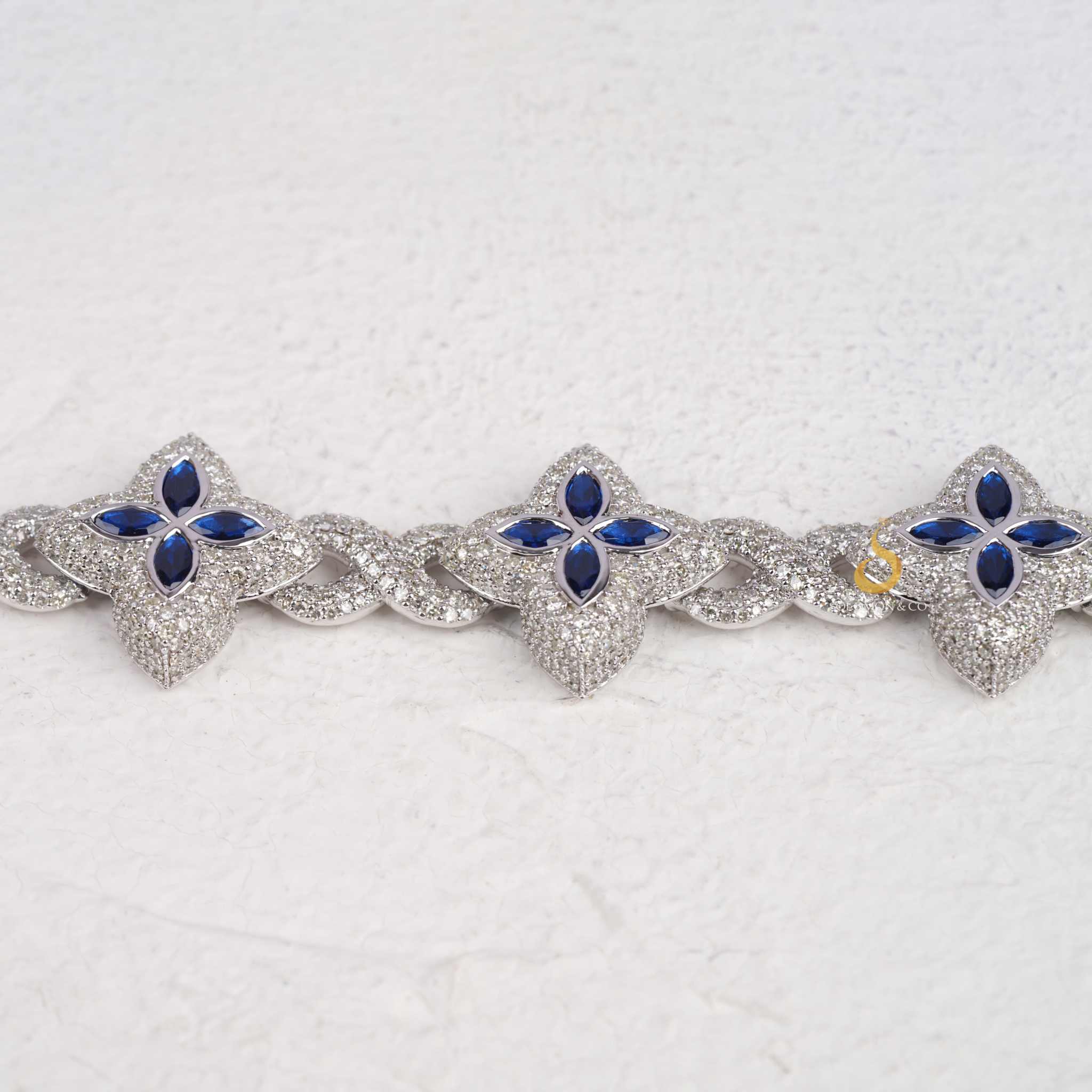 Clover Charm Bracelet With Blue Marquise And Round Diamonds