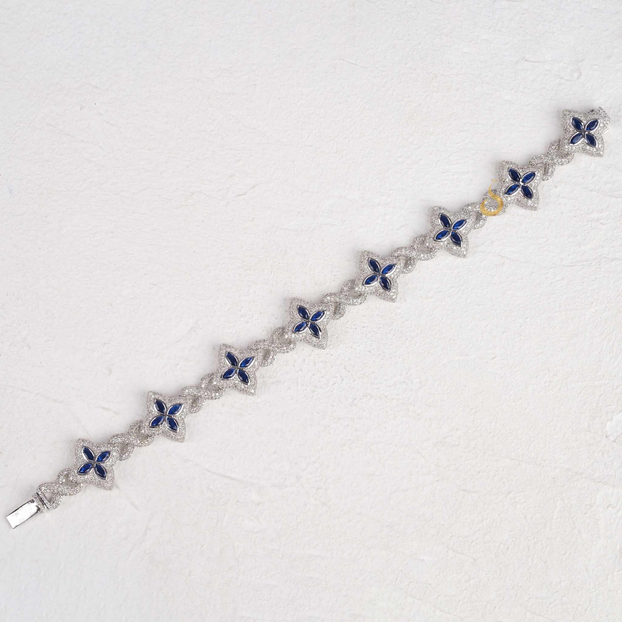 Clover Charm Bracelet With Blue Marquise And Round Diamonds